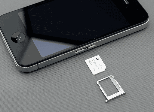 Alt: Phone and a physical SIM card