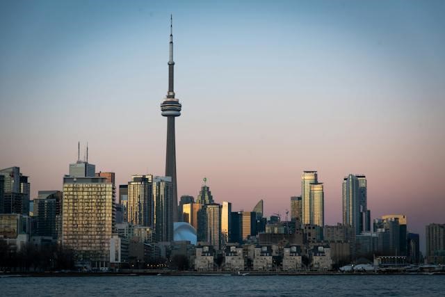 Skyline of Toronto at dusk with CN Tower dominating near the high buildings